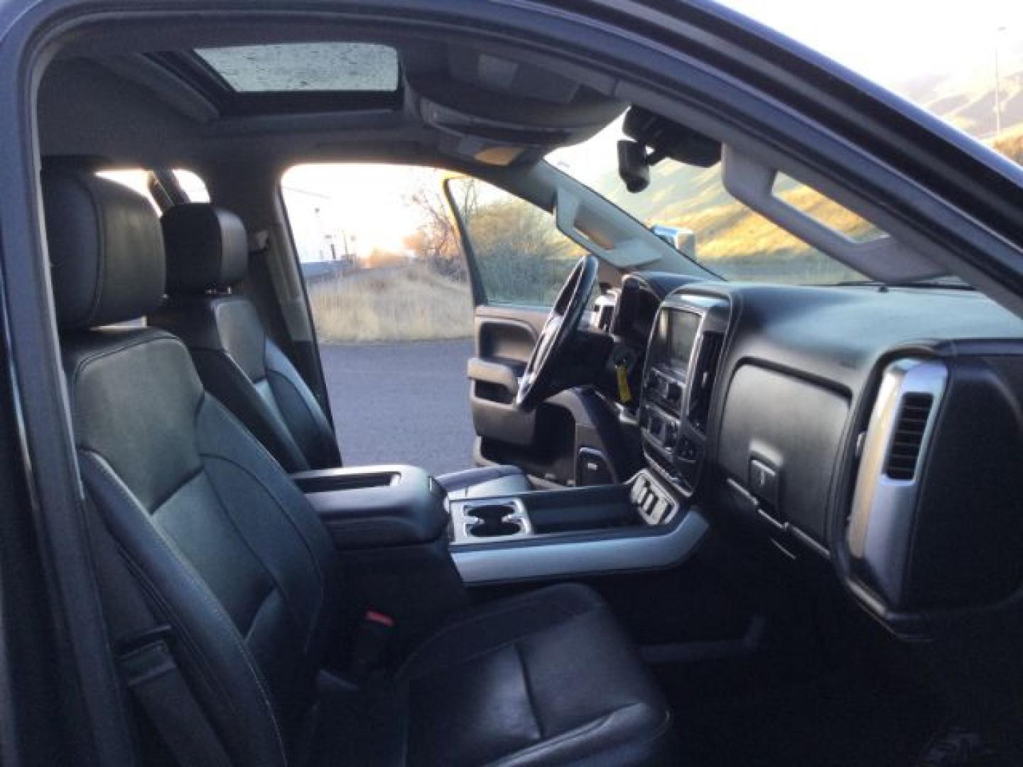 2016 Graystone Metallic /Black Leather Chevrolet Silverado 3500HD LTZ CREW CAB 4X4 (1GC4K0E85GF) with an Duramax 6.6L V-8 diesel direct injection engine, 6-Speed Automatic transmission, located at 1801 Main Street, Lewiston, 83501, (208) 743-9371, 46.417065, -117.004799- Photo#18