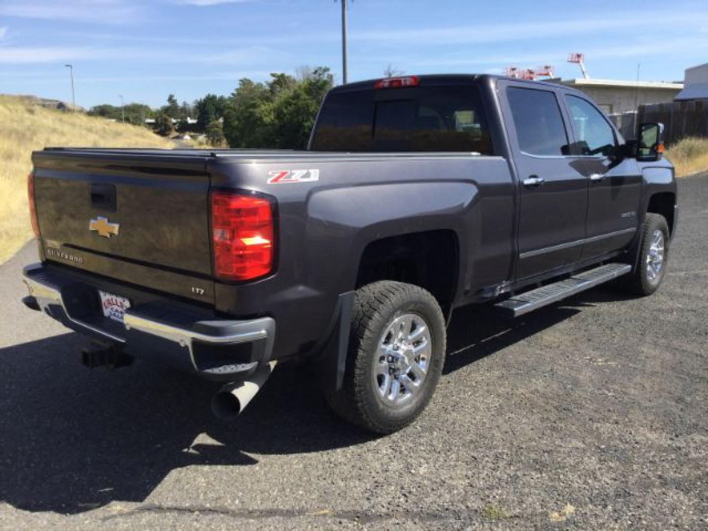 2016 Graystone Metallic /Black Leather Chevrolet Silverado 3500HD LTZ CREW CAB 4X4 (1GC4K0E85GF) with an Duramax 6.6L V-8 diesel direct injection engine, 6-Speed Automatic transmission, located at 1801 Main Street, Lewiston, 83501, (208) 743-9371, 46.417065, -117.004799- Photo#13