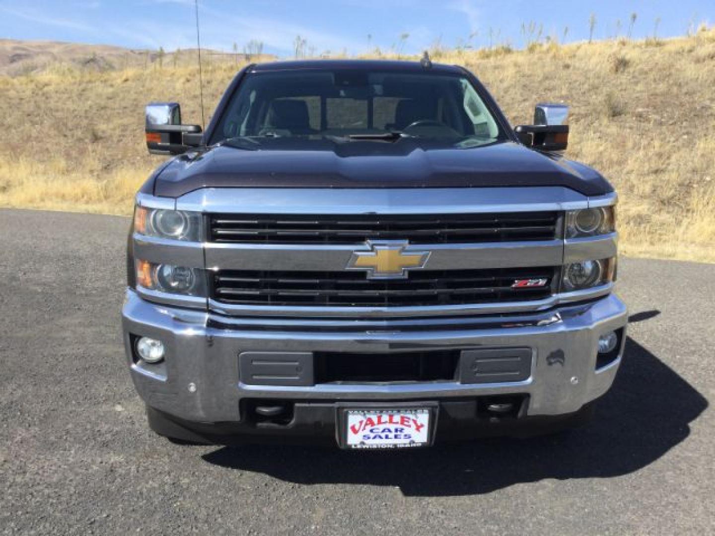 2016 Graystone Metallic /Black Leather Chevrolet Silverado 3500HD LTZ CREW CAB 4X4 (1GC4K0E85GF) with an Duramax 6.6L V-8 diesel direct injection engine, 6-Speed Automatic transmission, located at 1801 Main Street, Lewiston, 83501, (208) 743-9371, 46.417065, -117.004799- Photo#14