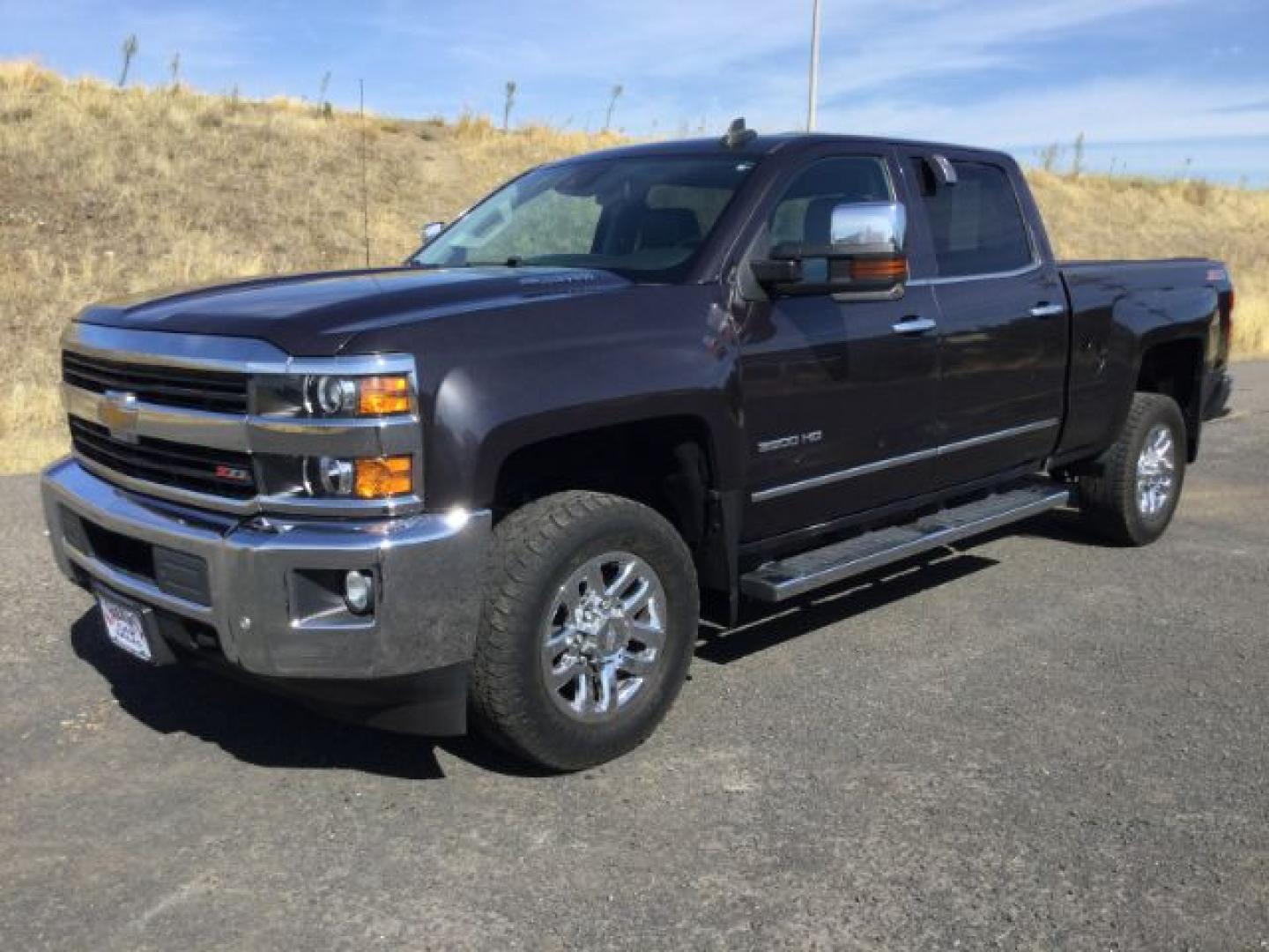 2016 Graystone Metallic /Black Leather Chevrolet Silverado 3500HD LTZ CREW CAB 4X4 (1GC4K0E85GF) with an Duramax 6.6L V-8 diesel direct injection engine, 6-Speed Automatic transmission, located at 1801 Main Street, Lewiston, 83501, (208) 743-9371, 46.417065, -117.004799- Photo#16