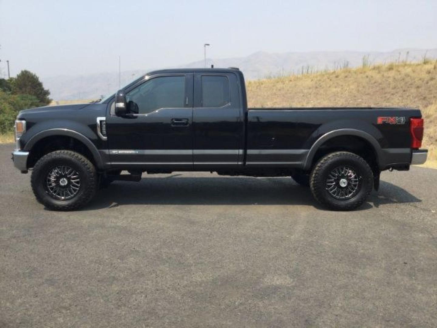 2020 Agate Black/Magnetic Metallic /Black, leather Ford F-350 SD Lariat SuperCab 4WD (1FT8X3BT4LE) with an 6.7L V8 OHV 16V DIESEL engine, 6-Speed Automatic transmission, located at 1801 Main Street, Lewiston, 83501, (208) 743-9371, 46.417065, -117.004799- Photo#2
