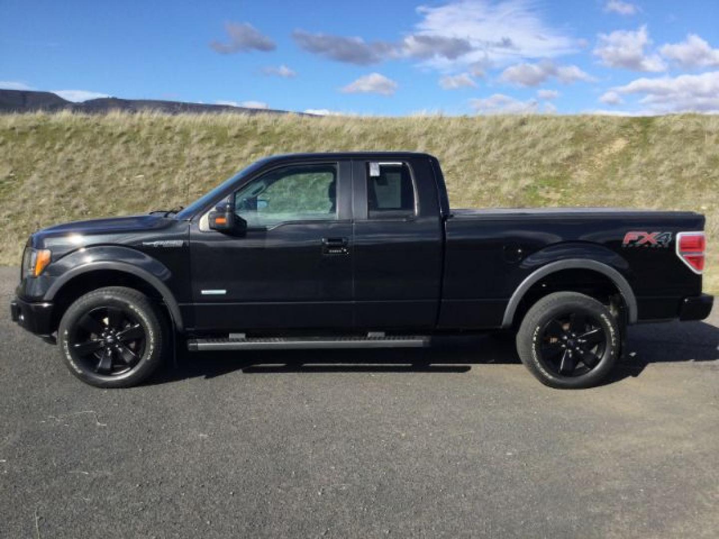 2012 Tuxedo Black Metallic /Black Cloth Ford F150 Supercab 4x4 FX4 Supercab 4WD (1FTFX1ET5CF) with an 3.5 Ecoboost V6 engine, 6-SPEED AUTOMATIC transmission, located at 1801 Main Street, Lewiston, 83501, (208) 743-9371, 46.417065, -117.004799- Photo#1