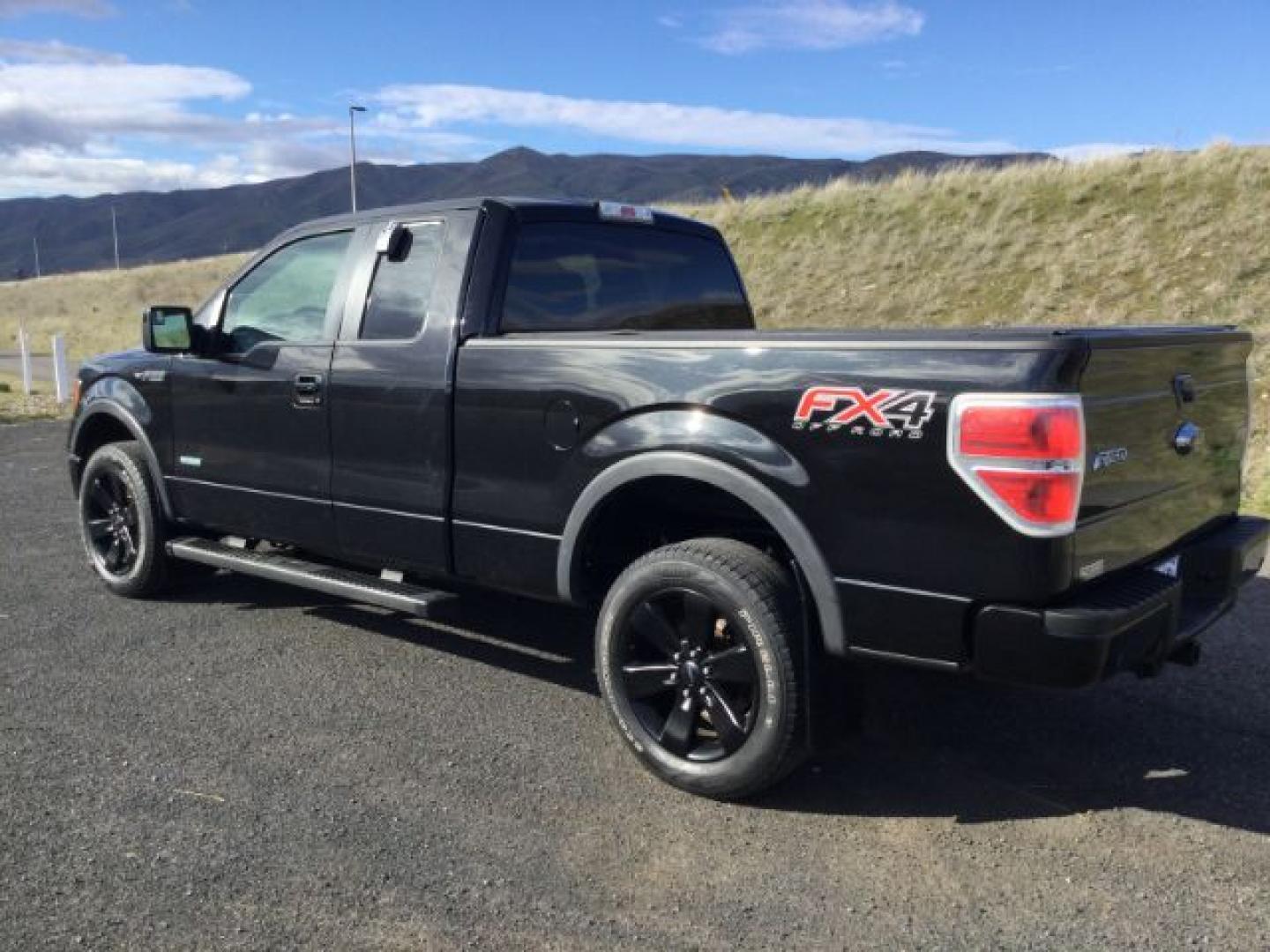 2012 Tuxedo Black Metallic /Black Cloth Ford F150 Supercab 4x4 FX4 Supercab 4WD (1FTFX1ET5CF) with an 3.5 Ecoboost V6 engine, 6-SPEED AUTOMATIC transmission, located at 1801 Main Street, Lewiston, 83501, (208) 743-9371, 46.417065, -117.004799- Photo#2