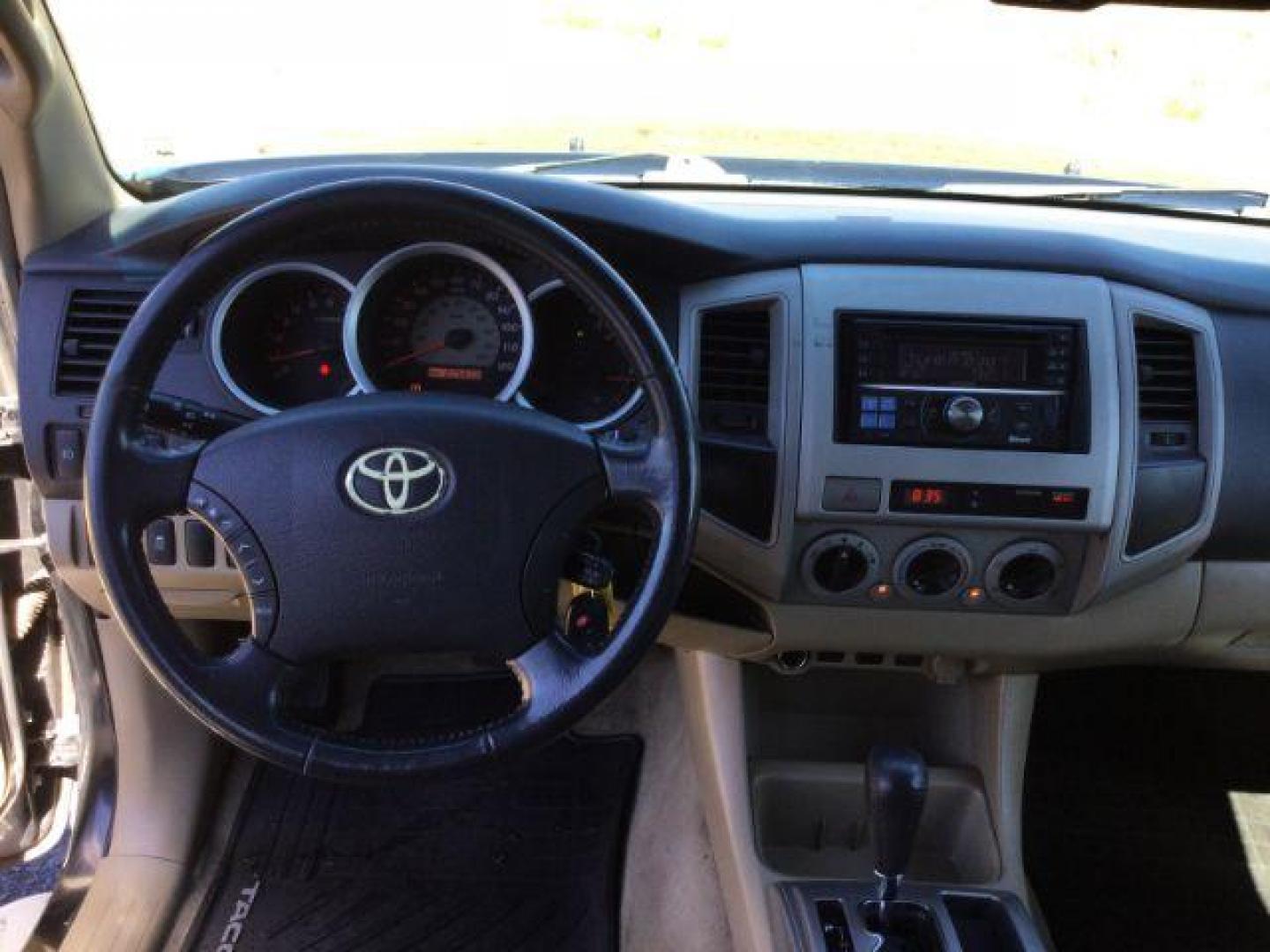 2010 Black Sand Pearl /Sand Beige Toyota Tacoma PreRunner V6 (3TMJU4GN1AM) with an 4L V-6 DOHC engine, 5-Speed Automatic transmission, located at 1801 Main Street, Lewiston, 83501, (208) 743-9371, 46.417065, -117.004799 - Photo#7