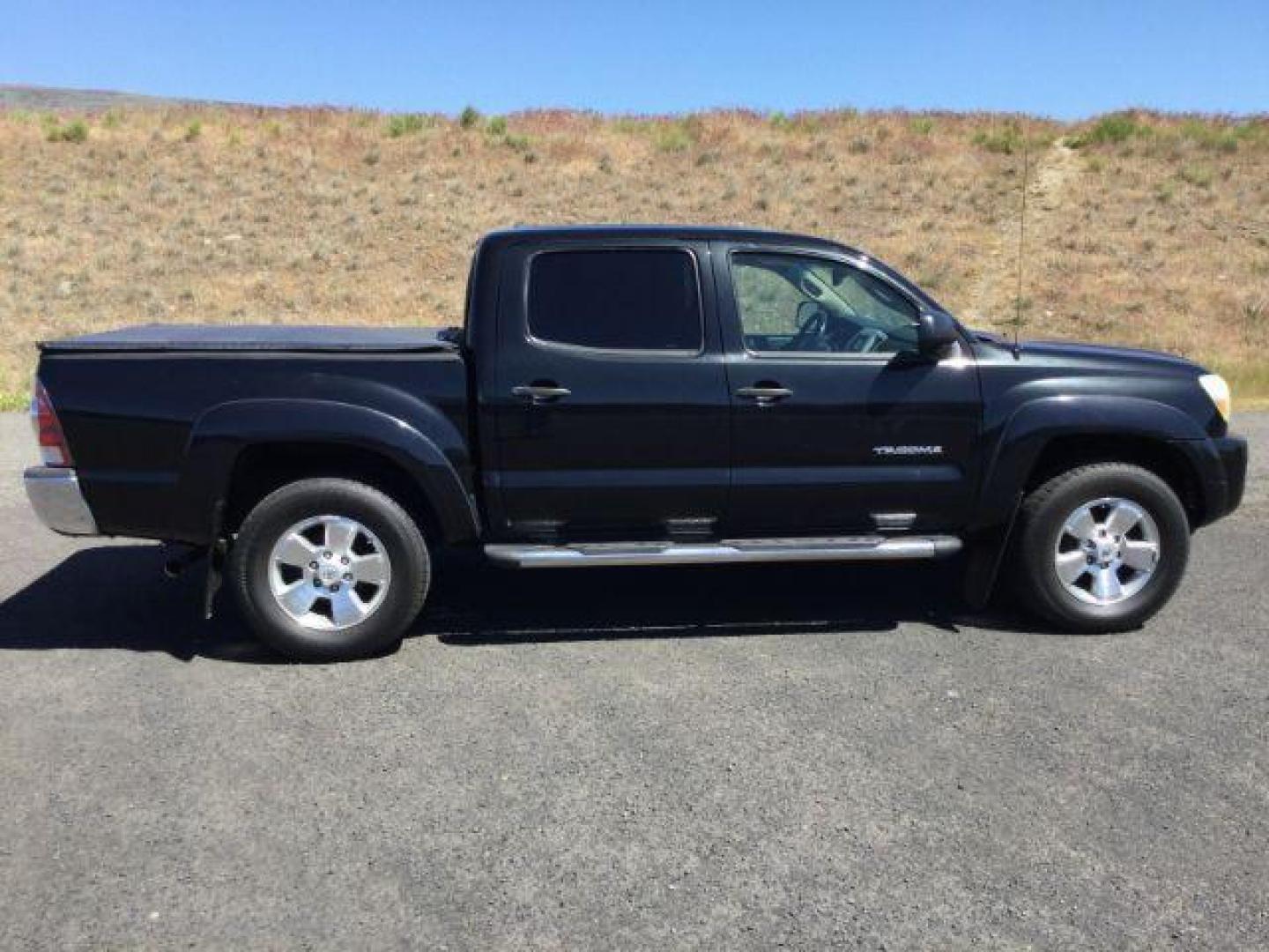 2010 Black Sand Pearl /Sand Beige Toyota Tacoma PreRunner V6 (3TMJU4GN1AM) with an 4L V-6 DOHC engine, 5-Speed Automatic transmission, located at 1801 Main Street, Lewiston, 83501, (208) 743-9371, 46.417065, -117.004799 - Photo#11