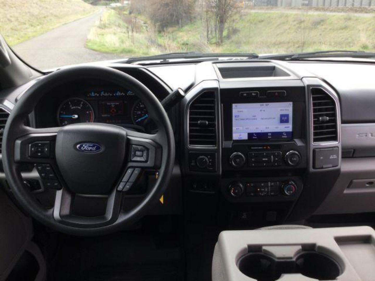 2022 Oxford White /Medium Earth Gray Ford F-350 XLT Crew Cab 4WD (1FT8W3BT5NE) with an 6.7L Powerstroke V8 engine, 10-speed automatic transmission, located at 1801 Main Street, Lewiston, 83501, (208) 743-9371, 46.417065, -117.004799 - Photo#5