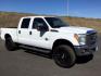 2011 Oxford White /Gray Cloth Ford F 250 Crew Cab 4x4 XLT (1FT7W2BTXBE) with an Powerstroke 6.7L V-8 diesel direct injection engine, 6-SPEED AUTOMATIC transmission, located at 1801 Main Street, Lewiston, 83501, (208) 743-9371, 46.417065, -117.004799 - Photo#17