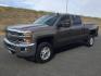 2015 Brownstone Metallic /Cocoa/Dune Chevrolet Silverado 2500HD LT (1GC1KVEGXFF) with an Vortec 6L V-8 variable valve control engine, 6-SPEED AUTOMATIC transmission, located at 1801 Main Street, Lewiston, 83501, (208) 743-9371, 46.417065, -117.004799 - Photo#0
