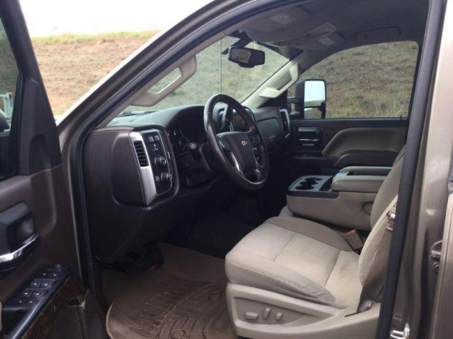 2015 Brownstone Metallic /Cocoa/Dune Chevrolet Silverado 2500HD LT (1GC1KVEGXFF) with an Vortec 6L V-8 variable valve control engine, 6-SPEED AUTOMATIC transmission, located at 1801 Main Street, Lewiston, 83501, (208) 743-9371, 46.417065, -117.004799 - Photo#2