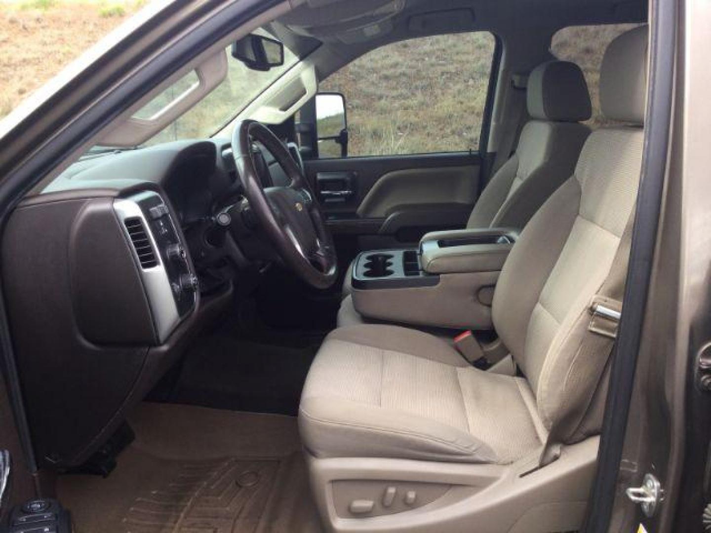 2015 Brownstone Metallic /Cocoa/Dune Chevrolet Silverado 2500HD LT (1GC1KVEGXFF) with an Vortec 6L V-8 variable valve control engine, 6-SPEED AUTOMATIC transmission, located at 1801 Main Street, Lewiston, 83501, (208) 743-9371, 46.417065, -117.004799 - Photo#3