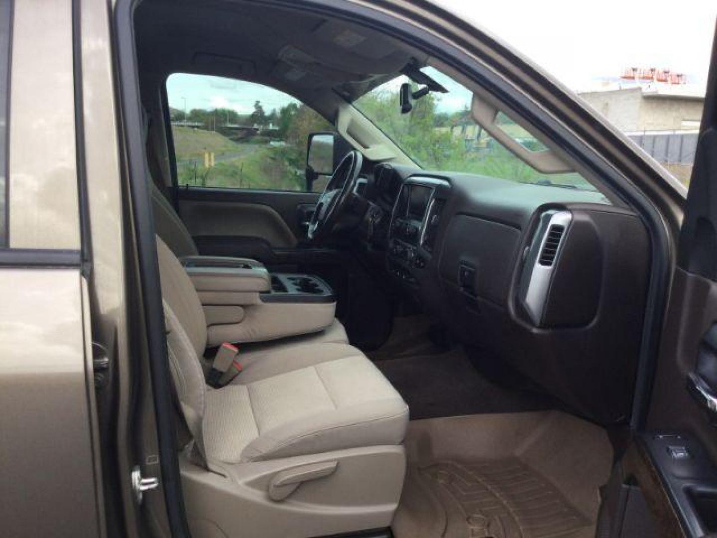 2015 Brownstone Metallic /Cocoa/Dune Chevrolet Silverado 2500HD LT (1GC1KVEGXFF) with an Vortec 6L V-8 variable valve control engine, 6-SPEED AUTOMATIC transmission, located at 1801 Main Street, Lewiston, 83501, (208) 743-9371, 46.417065, -117.004799 - Photo#9