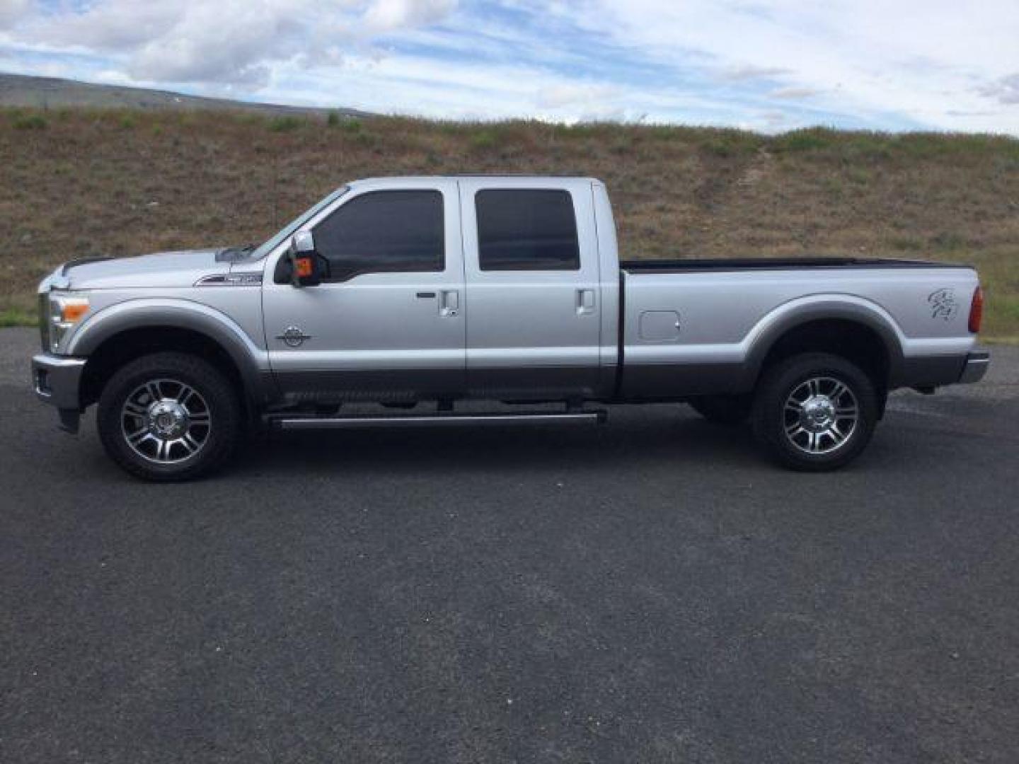2014 Silver/Gray /Black Ford F 350 Crew Cab 8ft Bed 4x4 LARIAT (1FT8W3BT1EE) with an Powerstroke 6.7L V-8 diesel direct injection engine, Auto transmission, located at 1801 Main Street, Lewiston, 83501, (208) 743-9371, 46.417065, -117.004799 - Photo#1