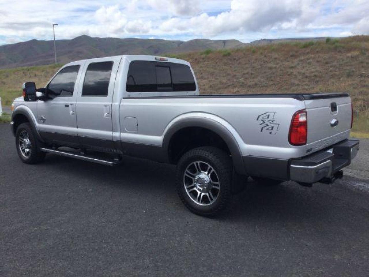 2014 Silver/Gray /Black Ford F 350 Crew Cab 8ft Bed 4x4 LARIAT (1FT8W3BT1EE) with an Powerstroke 6.7L V-8 diesel direct injection engine, Auto transmission, located at 1801 Main Street, Lewiston, 83501, (208) 743-9371, 46.417065, -117.004799 - Photo#2