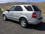 2009 Silver /Gray Kia Sorento LX (KNDJC735895) with an 3.3L V-6 DOHC engine, Automatic, 5-Spd w/Overdrive and Sportmatic transmission, located at 1801 Main Street, Lewiston, 83501, (208) 743-9371, 46.417065, -117.004799 - Photo#2