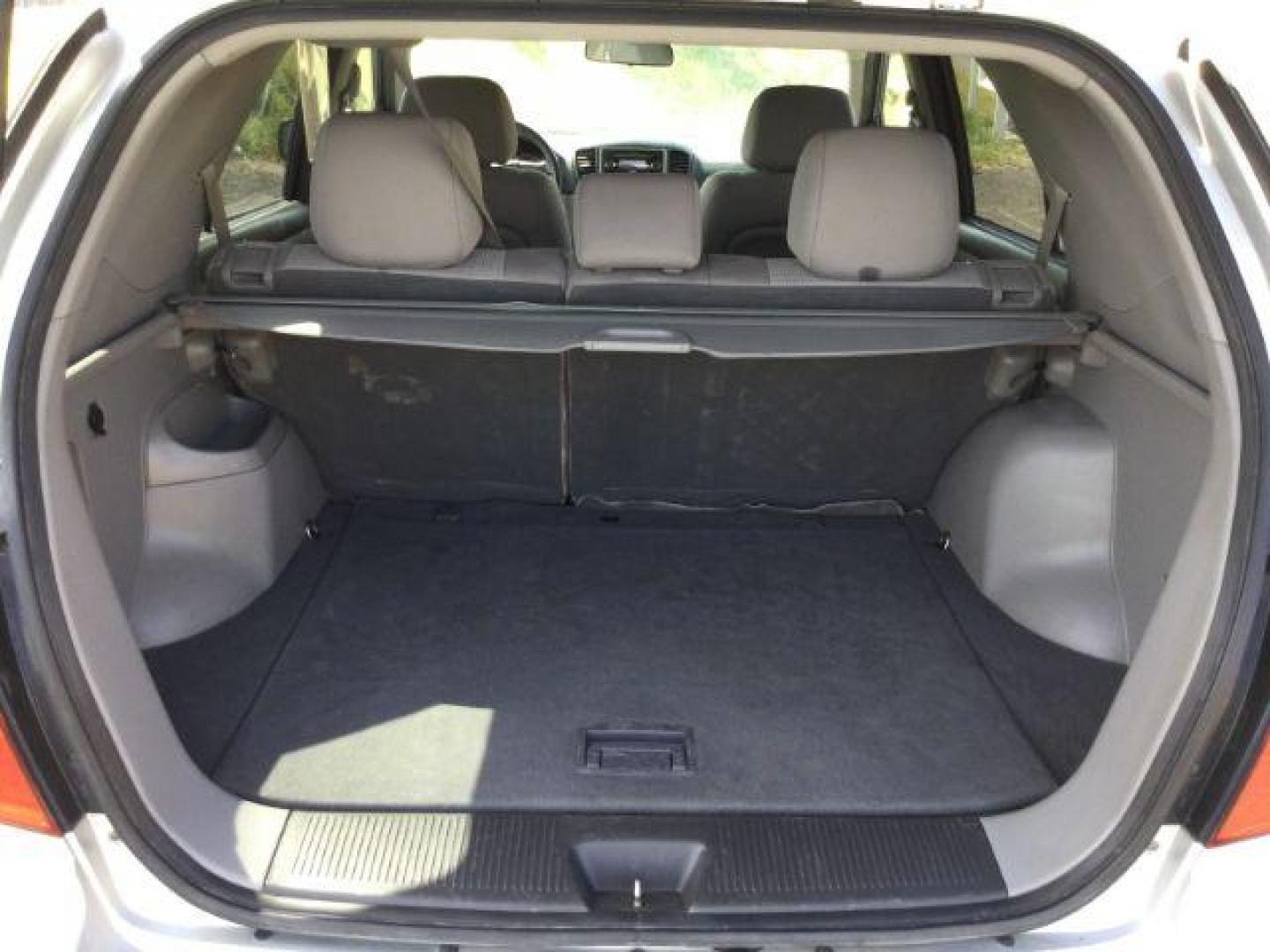 2009 Silver /Gray Kia Sorento LX (KNDJC735895) with an 3.3L V-6 DOHC engine, Automatic, 5-Spd w/Overdrive and Sportmatic transmission, located at 1801 Main Street, Lewiston, 83501, (208) 743-9371, 46.417065, -117.004799 - Photo#6