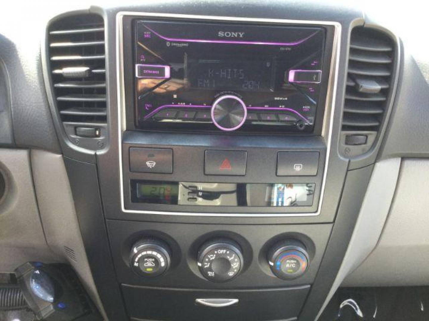 2009 Silver /Gray Kia Sorento LX (KNDJC735895) with an 3.3L V-6 DOHC engine, Automatic, 5-Spd w/Overdrive and Sportmatic transmission, located at 1801 Main Street, Lewiston, 83501, (208) 743-9371, 46.417065, -117.004799 - Photo#16