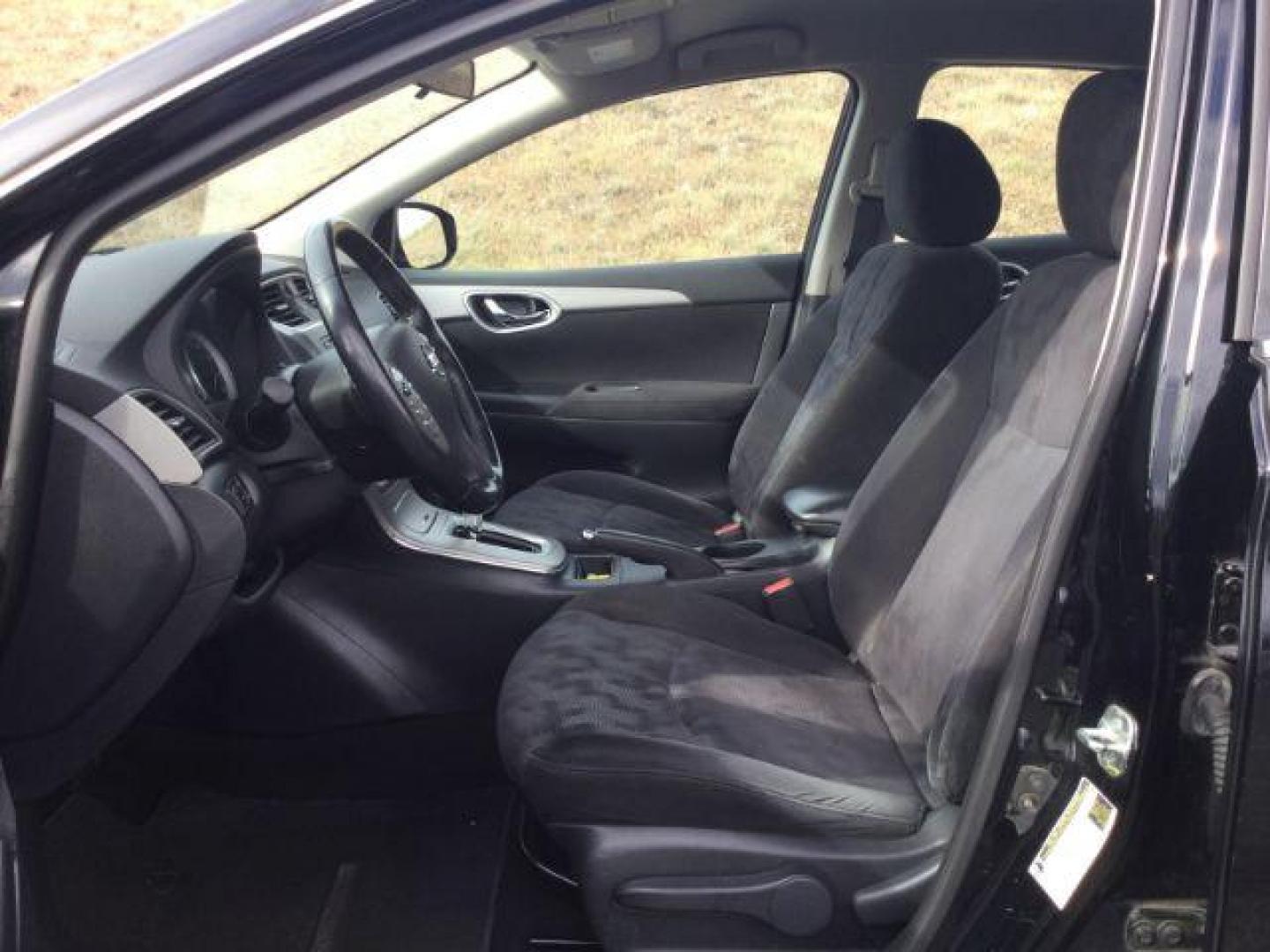 2013 Super Black /Charcoal Nissan Sentra SV (3N1AB7APXDL) with an 1.8L I-4 DOHC engine, Automatic, CVT w/Xtronic transmission, located at 1801 Main Street, Lewiston, 83501, (208) 743-9371, 46.417065, -117.004799 - Photo#4