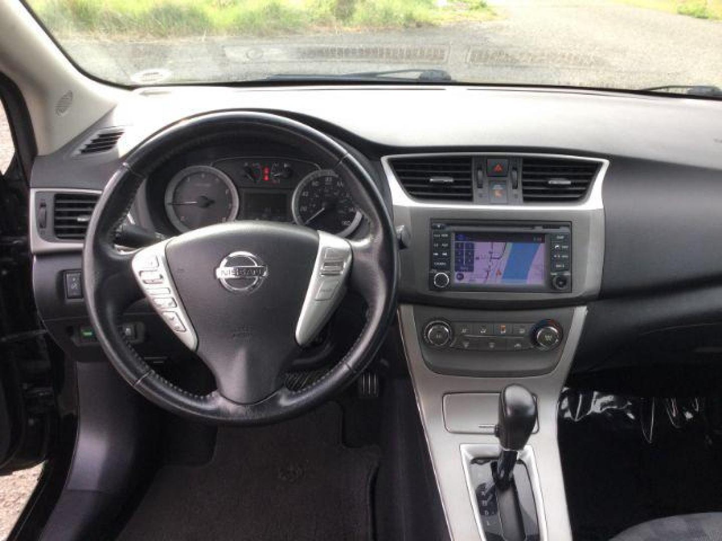 2013 Super Black /Charcoal Nissan Sentra SV (3N1AB7APXDL) with an 1.8L I-4 DOHC engine, Automatic, CVT w/Xtronic transmission, located at 1801 Main Street, Lewiston, 83501, (208) 743-9371, 46.417065, -117.004799 - Photo#6