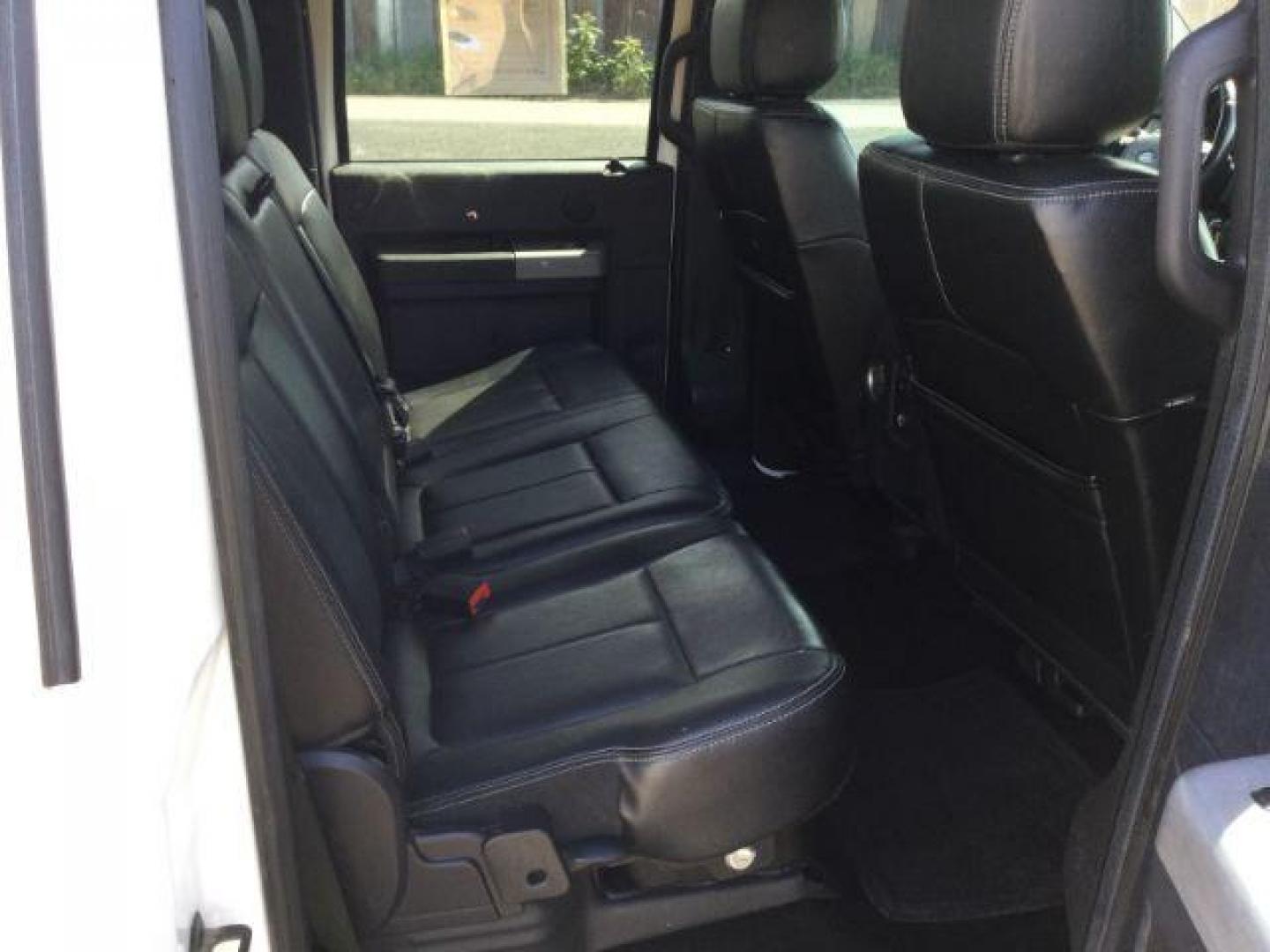 2016 White Platinum Metallic Tri-Coat /Black Ford F 350 Crew Cab 8ft Bed 4x4 LARIAT (1FT8W3BT8GE) with an Powerstroke 6.7L V-8 diesel direct injection engine, Auto transmission, located at 1801 Main Street, Lewiston, 83501, (208) 743-9371, 46.417065, -117.004799 - Photo#8