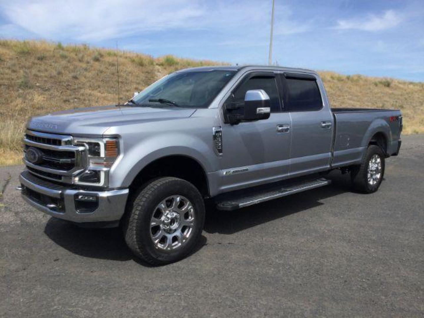 2020 Iconic Silver Metallic /Black Ford F 350 Crew Cab 8ft Bed 4x4 LARIAT (1FT8W3BT0LE) with an Powerstroke 6.7L V-8 diesel direct injection engine, Auto transmission, located at 1801 Main Street, Lewiston, 83501, (208) 743-9371, 46.417065, -117.004799 - Photo#0