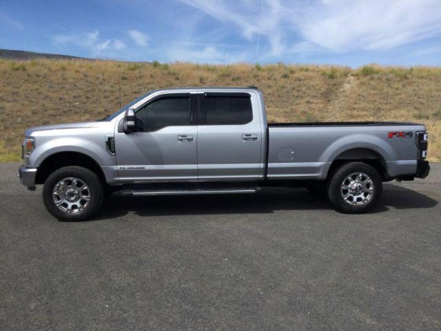 2020 Iconic Silver Metallic /Black Ford F 350 Crew Cab 8ft Bed 4x4 LARIAT (1FT8W3BT0LE) with an Powerstroke 6.7L V-8 diesel direct injection engine, Auto transmission, located at 1801 Main Street, Lewiston, 83501, (208) 743-9371, 46.417065, -117.004799 - Photo#1
