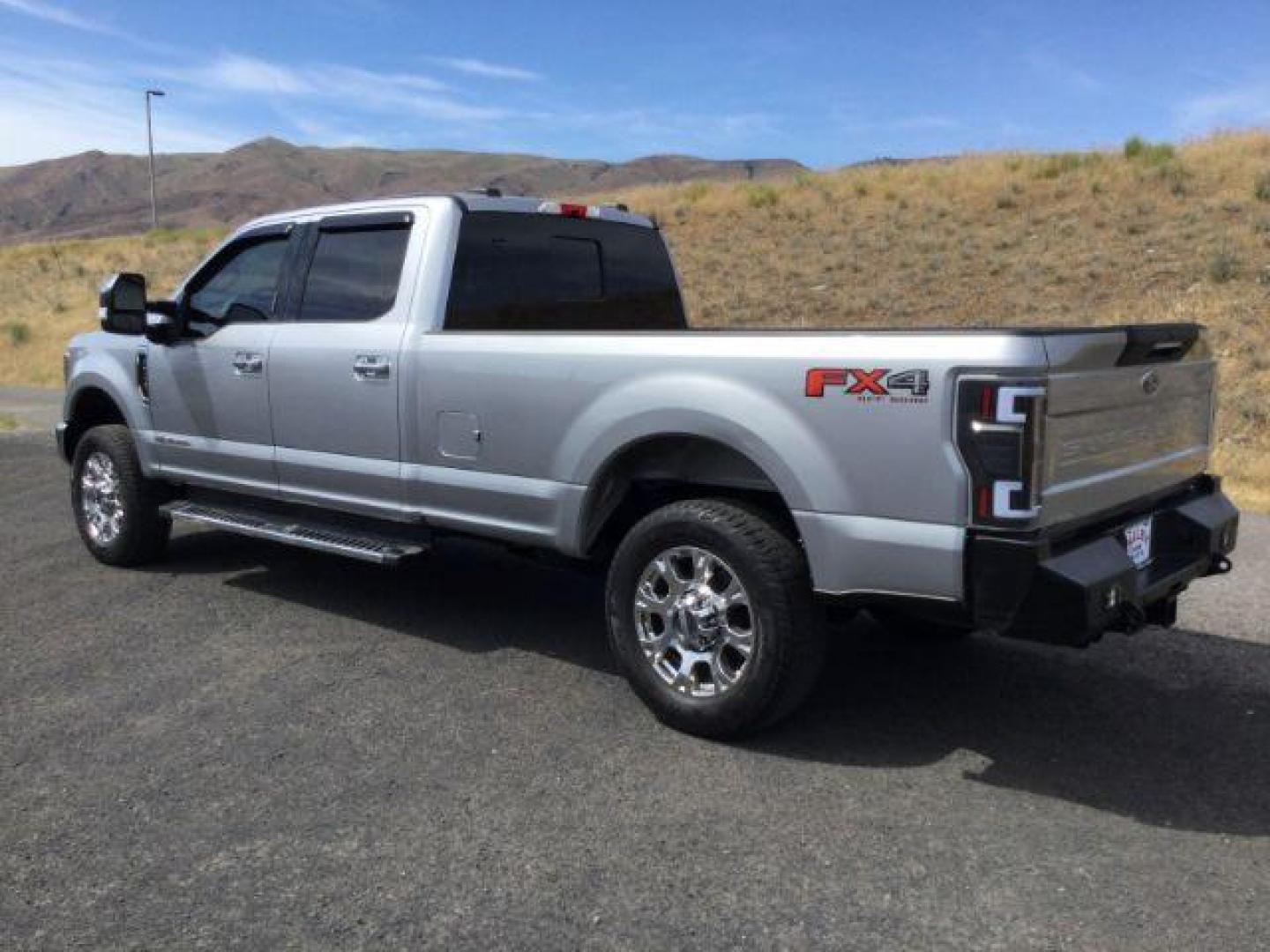 2020 Iconic Silver Metallic /Black Ford F 350 Crew Cab 8ft Bed 4x4 LARIAT (1FT8W3BT0LE) with an Powerstroke 6.7L V-8 diesel direct injection engine, Auto transmission, located at 1801 Main Street, Lewiston, 83501, (208) 743-9371, 46.417065, -117.004799 - Photo#2