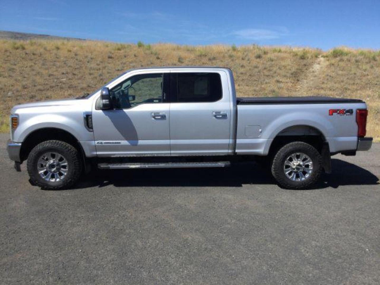 2019 Ingot Silver Metallic /Medium Earth Gray Ford F-350 XLT Crew Cab 4WD (1FT8W3BT3KE) with an Powerstroke 6.7L V-8 diesel direct injection engine, 6-Speed Automatic transmission, located at 1801 Main Street, Lewiston, 83501, (208) 743-9371, 46.417065, -117.004799 - Photo#1