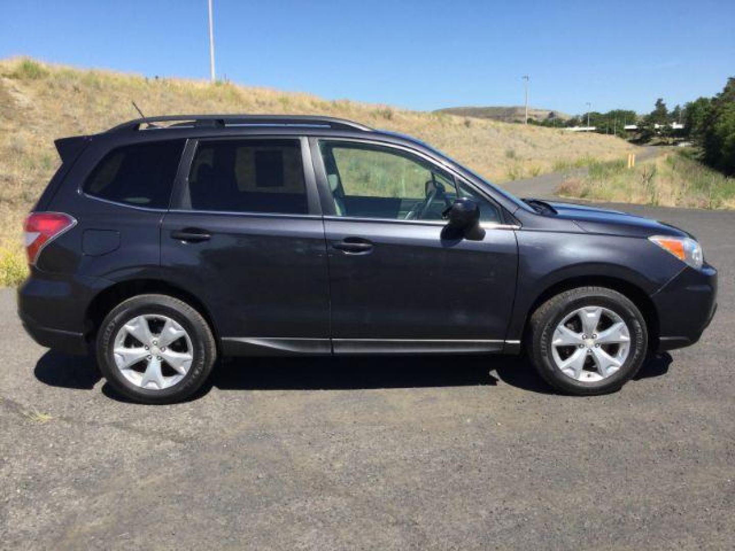 2014 Dark Gray Metallic /Gray Subaru Forester 2.5i Limited (JF2SJAJC8EH) with an 2.5L H-4 DOHC engine, Auto, CVT w/ Lineartronic transmission, located at 1801 Main Street, Lewiston, 83501, (208) 743-9371, 46.417065, -117.004799 - Photo#1
