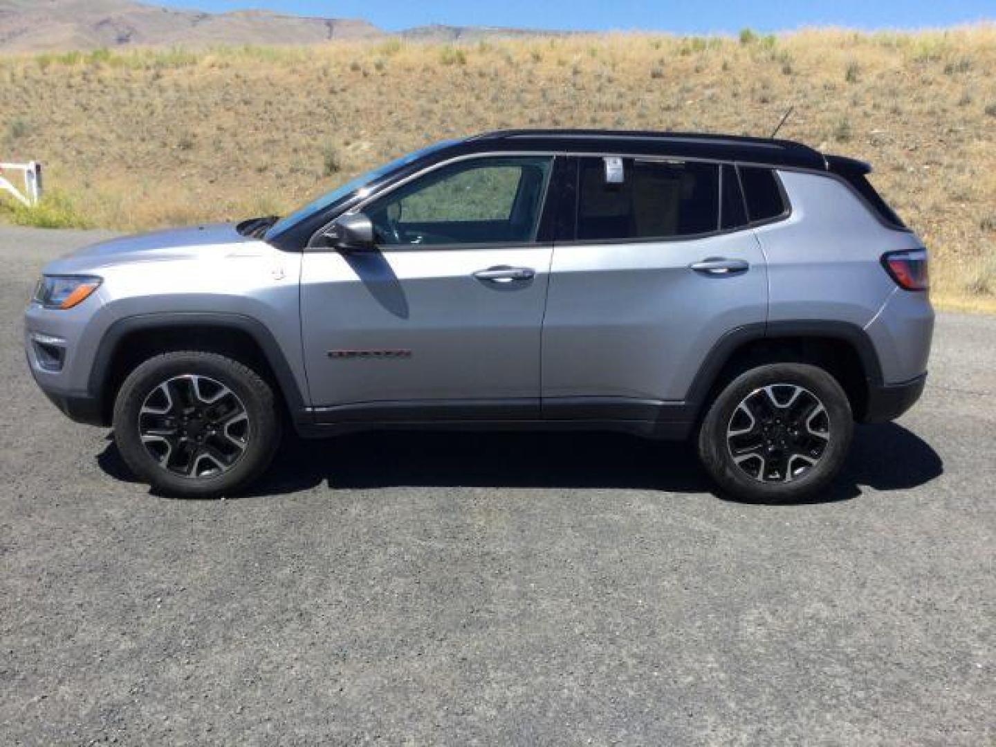 2020 Billet Silver Metallic Clearcoat /Ruby Red/Black Jeep Compass Trailhawk 4X4 (3C4NJDDB2LT) with an 2.4L I-4 variable valve control engine, 9 Speed Automatic transmission, located at 1801 Main Street, Lewiston, 83501, (208) 743-9371, 46.417065, -117.004799 - Photo#2