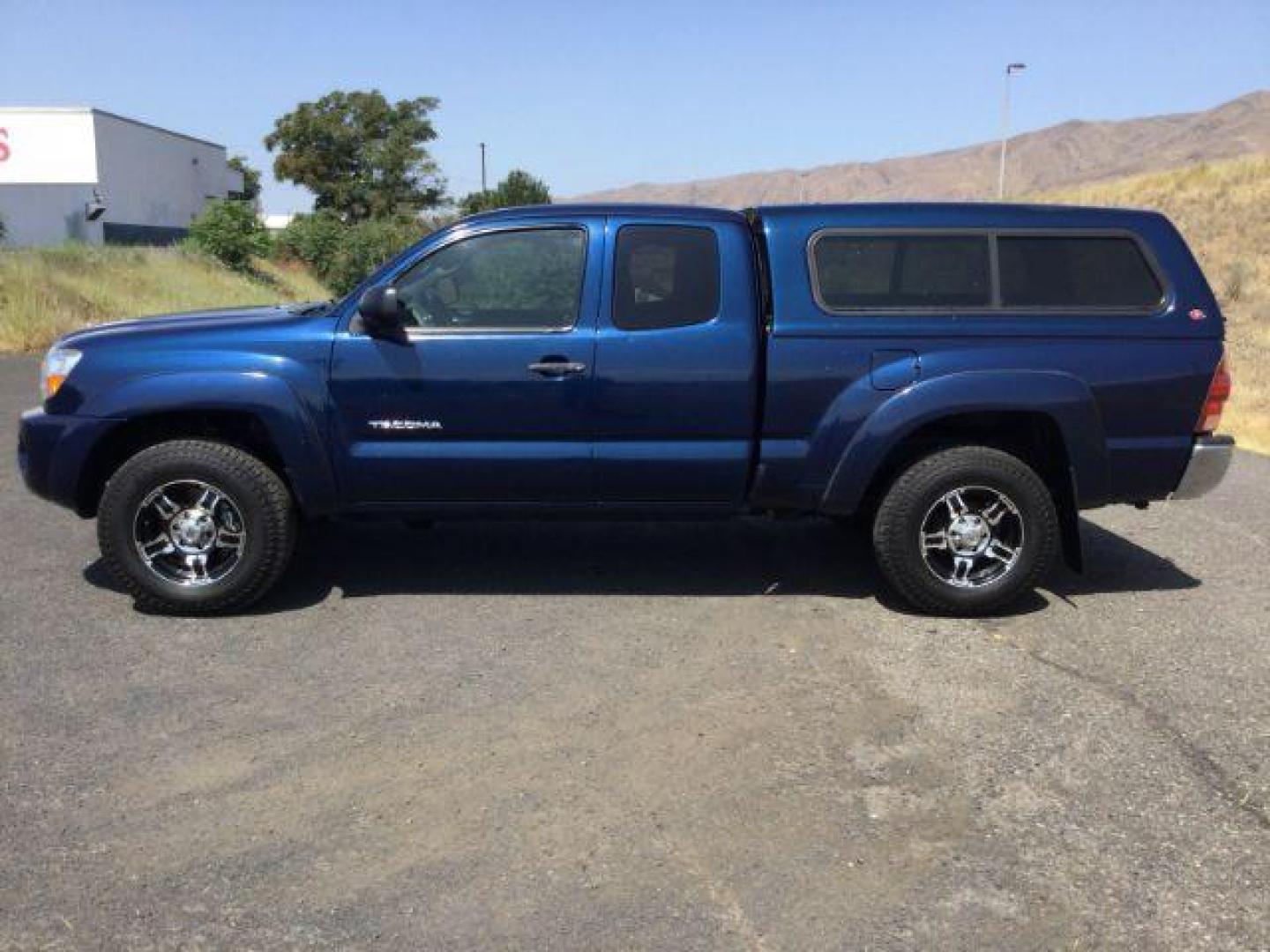 2006 Speedway Blue /Graphite Toyota Tacoma Base V6 (5TEUU42N26Z) with an 4L V-6 DOHC engine, automatic transmission, located at 1801 Main Street, Lewiston, 83501, (208) 743-9371, 46.417065, -117.004799 - Photo#1