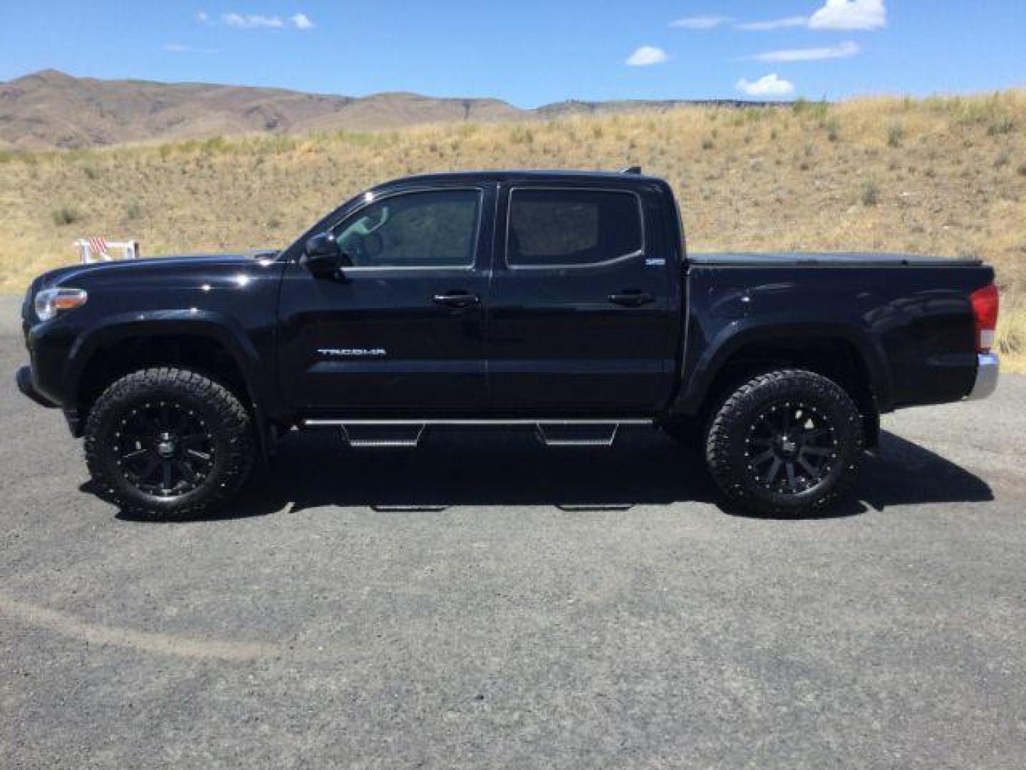2017 Black /Cement Gray Toyota Tacoma SR5 V6 Crew Cab 4x4 (3TMCZ5AN4HM) with an 3.5L V-6 port/direct injection engine, 6-Speed Automatic transmission, located at 1801 Main Street, Lewiston, 83501, (208) 743-9371, 46.417065, -117.004799 - Photo#1