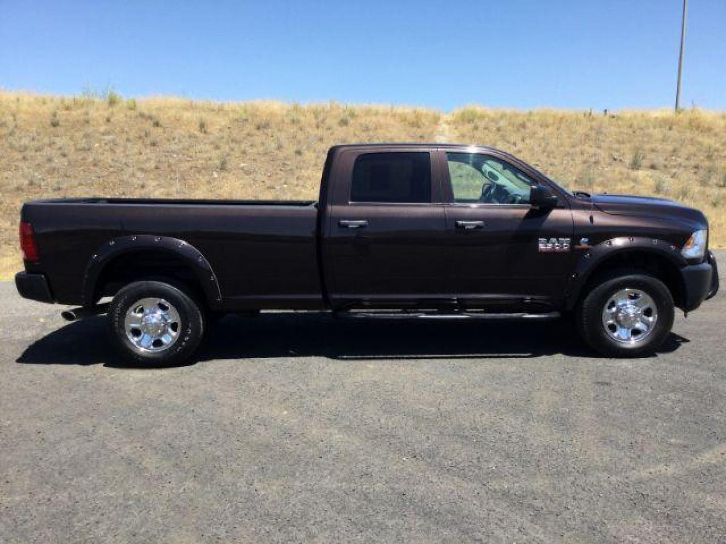 2016 Luxury Brown Pearlcoat /Diesel Gray/Black Ram 2500 Tradesman (3C6UR5HL7GG) with an 6.7L L6 OHV 24V TURBO DIESEL engine, 6-Speed Automatic transmission, located at 1801 Main Street, Lewiston, 83501, (208) 743-9371, 46.417065, -117.004799 - Photo#1