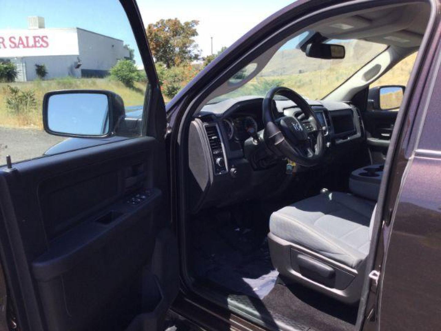 2016 Luxury Brown Pearlcoat /Diesel Gray/Black Ram 2500 Tradesman (3C6UR5HL7GG) with an 6.7L L6 OHV 24V TURBO DIESEL engine, 6-Speed Automatic transmission, located at 1801 Main Street, Lewiston, 83501, (208) 743-9371, 46.417065, -117.004799 - Photo#4