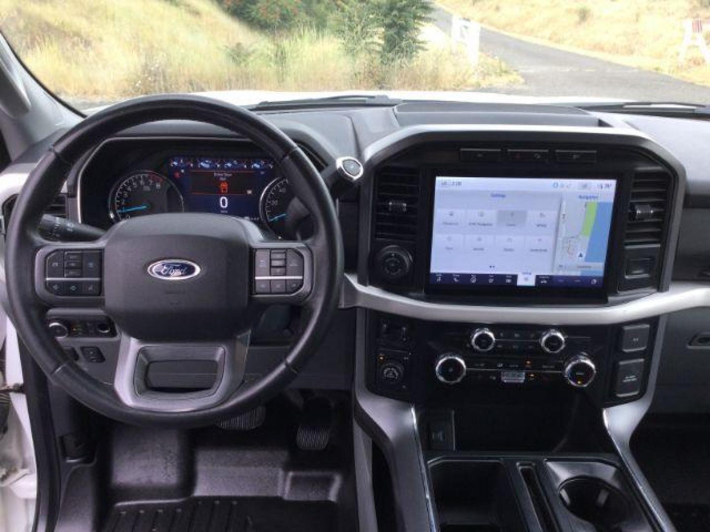 2023 Oxford White /Black w/Medium Dark Slate Ford F-150 SuperCrew Cab XLT Pickup 4D 6 1/2 ft (1FTFW1E52PK) with an V8, Flex Fuel, 5.0 Liter engine, 10-speed automatic transmission, located at 1801 Main Street, Lewiston, 83501, (208) 743-9371, 46.417065, -117.004799 - Photo#4