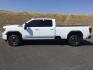 2023 Summit White /Jet Black w/Kalahari Accents GMC Sierra 3500HD 4WD Crew Cab Long Bed AT4 (1GT49VEY1PF) with an Duramax 6.6L V-8 diesel direct injection engine, 10-speed automatic transmission, located at 1801 Main Street, Lewiston, 83501, (208) 743-9371, 46.417065, -117.004799 - Photo#1