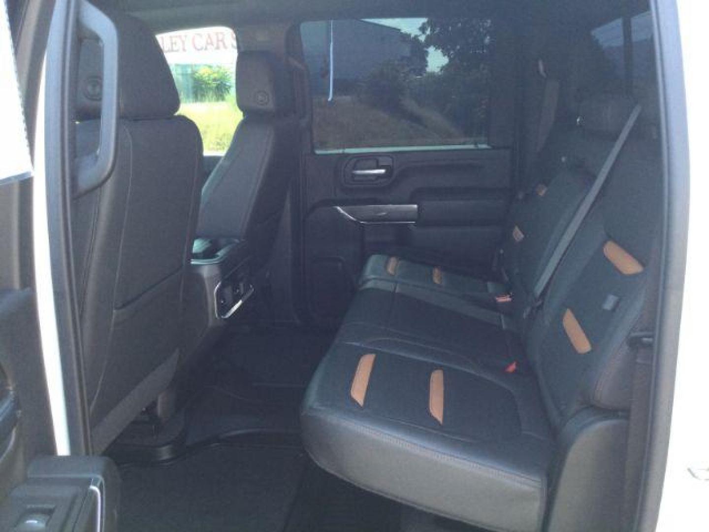 2023 Summit White /Jet Black w/Kalahari Accents GMC Sierra 3500HD 4WD Crew Cab Long Bed AT4 (1GT49VEY1PF) with an Duramax 6.6L V-8 diesel direct injection engine, 10-speed automatic transmission, located at 1801 Main Street, Lewiston, 83501, (208) 743-9371, 46.417065, -117.004799 - Photo#5