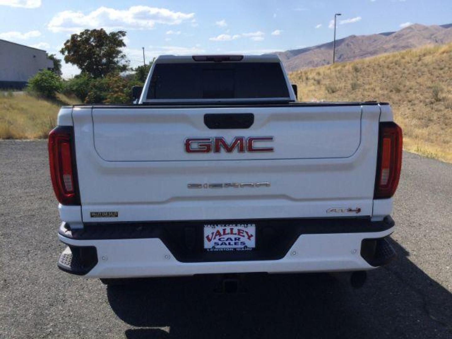 2023 Summit White /Jet Black w/Kalahari Accents GMC Sierra 3500HD 4WD Crew Cab Long Bed AT4 (1GT49VEY1PF) with an Duramax 6.6L V-8 diesel direct injection engine, 10-speed automatic transmission, located at 1801 Main Street, Lewiston, 83501, (208) 743-9371, 46.417065, -117.004799 - Photo#11