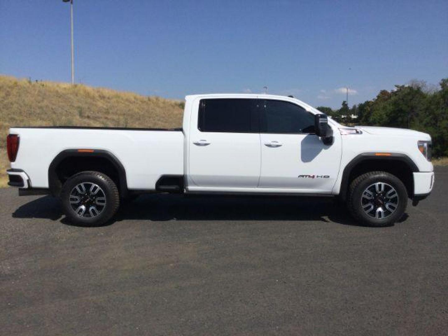 2023 Summit White /Jet Black w/Kalahari Accents GMC Sierra 3500HD 4WD Crew Cab Long Bed AT4 (1GT49VEY1PF) with an Duramax 6.6L V-8 diesel direct injection engine, 10-speed automatic transmission, located at 1801 Main Street, Lewiston, 83501, (208) 743-9371, 46.417065, -117.004799 - Photo#12
