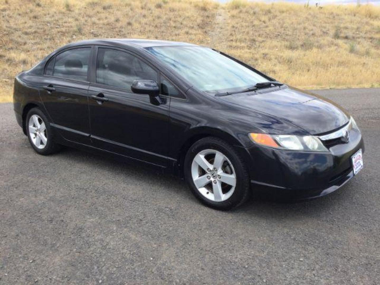 2006 Nighthawk Black Pearl /Ivory Honda Civic EX (1HGFA16886L) with an 1.8L I-4 i-VTEC variable valve control engine, CVT automatic transmission, located at 1801 Main Street, Lewiston, 83501, (208) 743-9371, 46.417065, -117.004799 - Photo#0