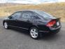 2006 Nighthawk Black Pearl /Ivory Honda Civic EX (1HGFA16886L) with an 1.8L I-4 i-VTEC variable valve control engine, CVT automatic transmission, located at 1801 Main Street, Lewiston, 83501, (208) 743-9371, 46.417065, -117.004799 - Photo#7