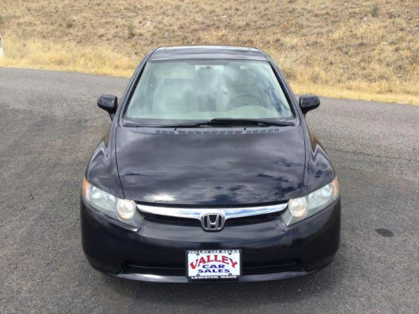 2006 Nighthawk Black Pearl /Ivory Honda Civic EX (1HGFA16886L) with an 1.8L I-4 i-VTEC variable valve control engine, CVT automatic transmission, located at 1801 Main Street, Lewiston, 83501, (208) 743-9371, 46.417065, -117.004799 - Photo#19