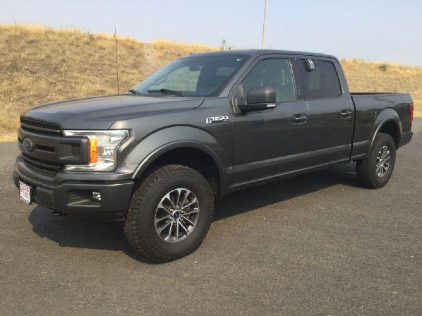 2018 Magnetic Metallic /Black Ford F-150 SuperCrew Cab XLT Pickup 4D 6 1/2 ft (1FTFW1EG6JK) with an EcoBoost 3.5L V-6 port/direct injection engine, 10-speed automatic transmission, located at 1801 Main Street, Lewiston, 83501, (208) 743-9371, 46.417065, -117.004799 - Photo#1