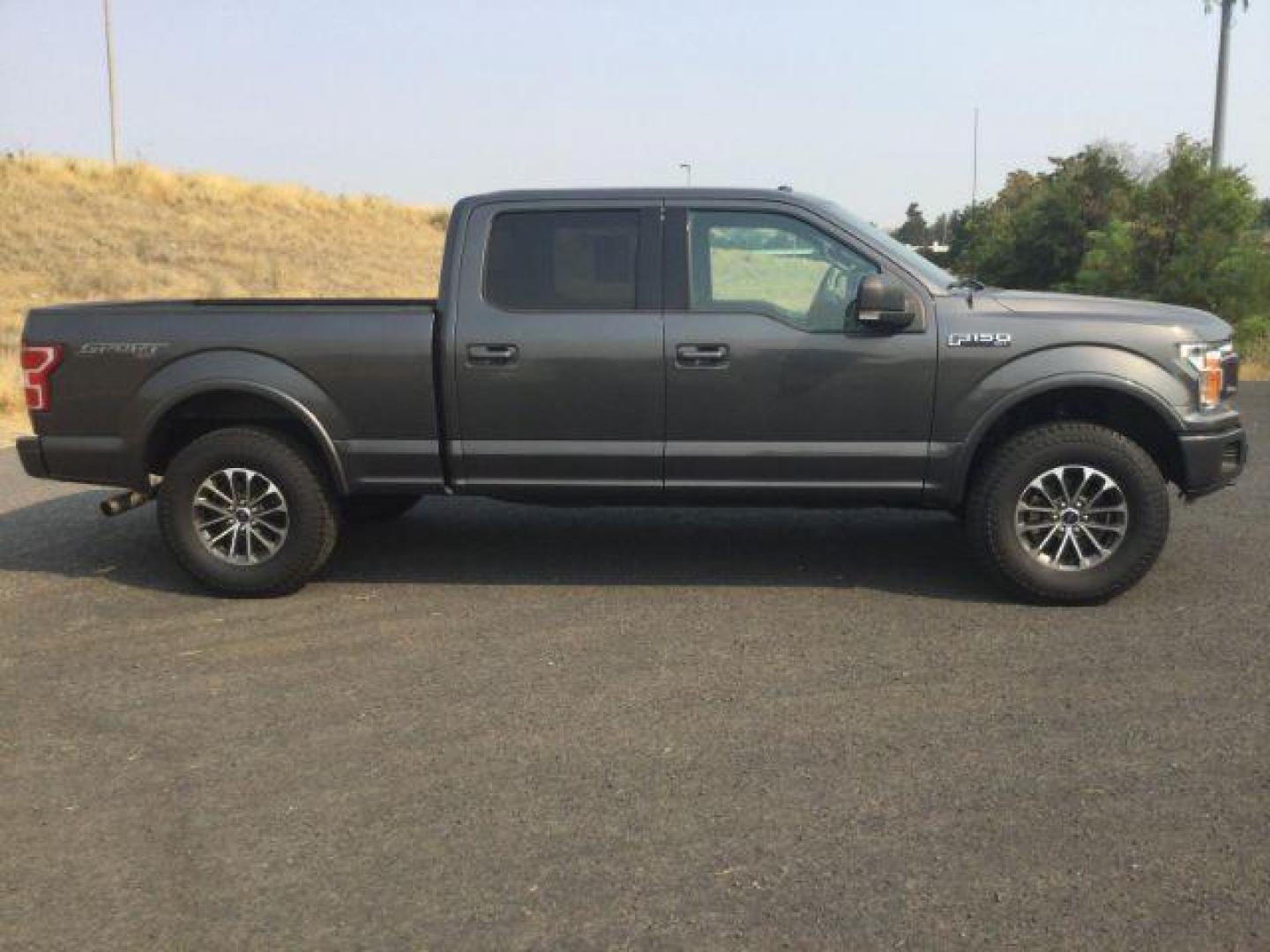 2018 Magnetic Metallic /Black Ford F-150 SuperCrew Cab XLT Pickup 4D 6 1/2 ft (1FTFW1EG6JK) with an EcoBoost 3.5L V-6 port/direct injection engine, 10-speed automatic transmission, located at 1801 Main Street, Lewiston, 83501, (208) 743-9371, 46.417065, -117.004799 - Photo#2