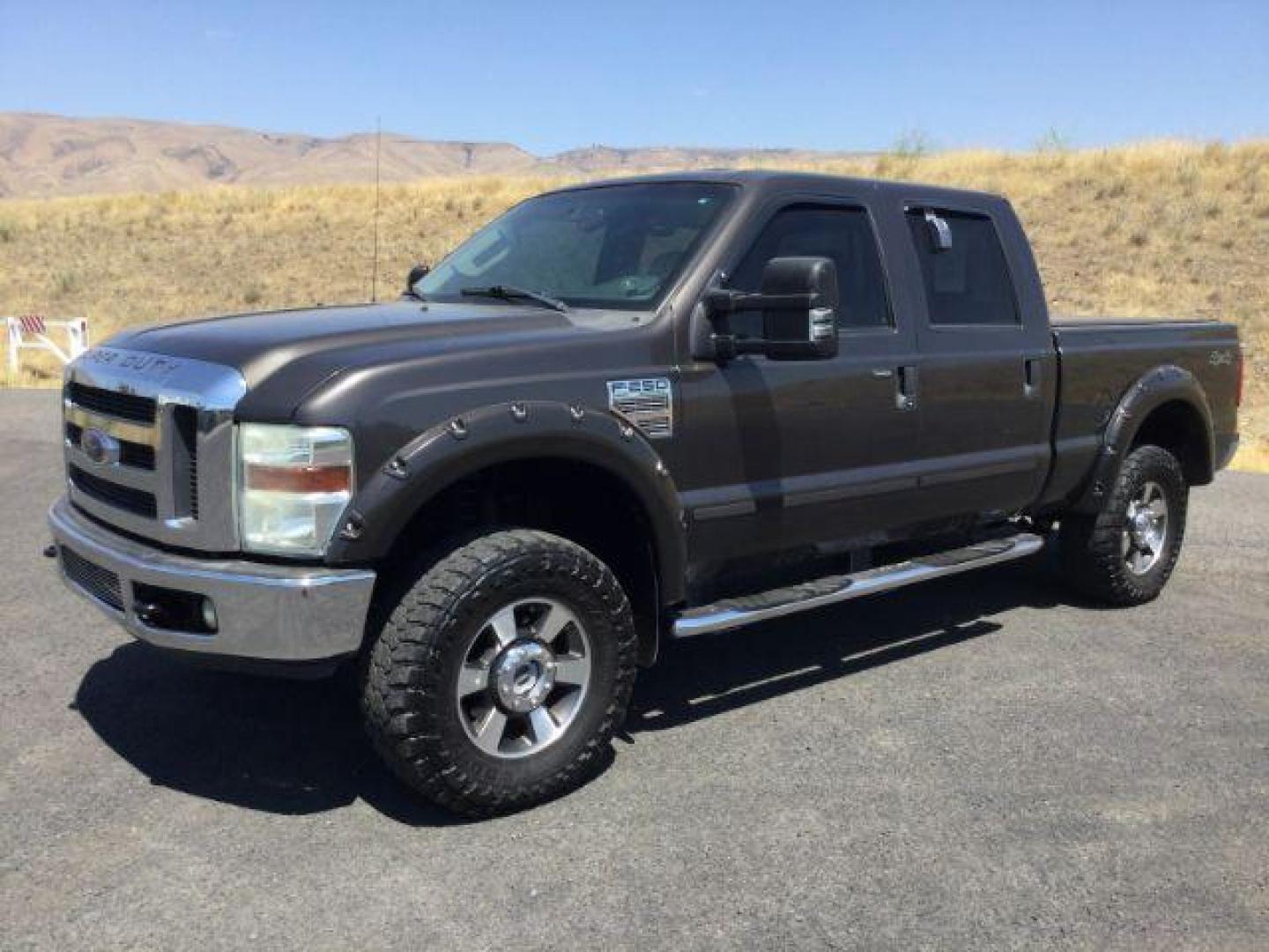 2008 Dark Shadow Gray Clearcoat Metallic Ford F-250 Lariat SuperCrew 6.5ft bed 4WD (1FTSW21R08E) with an 6.4L V8, Turbo Diesel engine, 6-SPEED AUTOMATIC transmission, located at 1801 Main Street, Lewiston, 83501, (208) 743-9371, 46.417065, -117.004799 - Photo#0