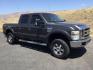 2008 Dark Shadow Gray Clearcoat Metallic Ford F-250 Lariat SuperCrew 6.5ft bed 4WD (1FTSW21R08E) with an 6.4L V8, Turbo Diesel engine, 6-SPEED AUTOMATIC transmission, located at 1801 Main Street, Lewiston, 83501, (208) 743-9371, 46.417065, -117.004799 - Photo#2
