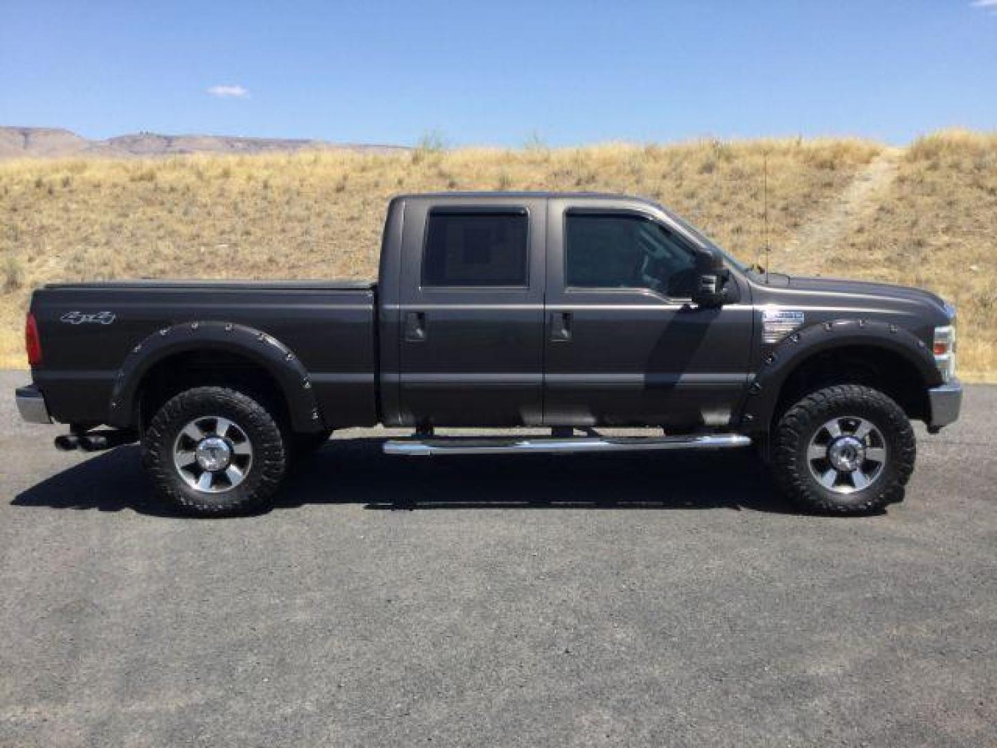 2008 Dark Shadow Gray Clearcoat Metallic Ford F-250 Lariat SuperCrew 6.5ft bed 4WD (1FTSW21R08E) with an 6.4L V8, Turbo Diesel engine, 6-SPEED AUTOMATIC transmission, located at 1801 Main Street, Lewiston, 83501, (208) 743-9371, 46.417065, -117.004799 - Photo#7