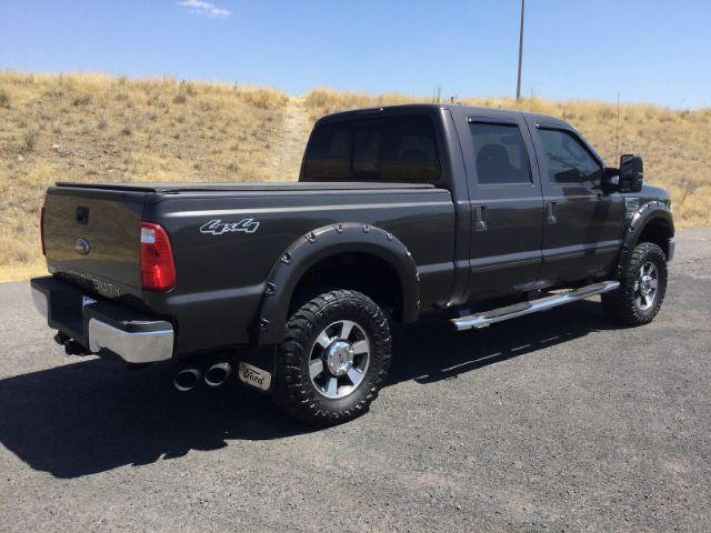 2008 Dark Shadow Gray Clearcoat Metallic Ford F-250 Lariat SuperCrew 6.5ft bed 4WD (1FTSW21R08E) with an 6.4L V8, Turbo Diesel engine, 6-SPEED AUTOMATIC transmission, located at 1801 Main Street, Lewiston, 83501, (208) 743-9371, 46.417065, -117.004799 - Photo#8