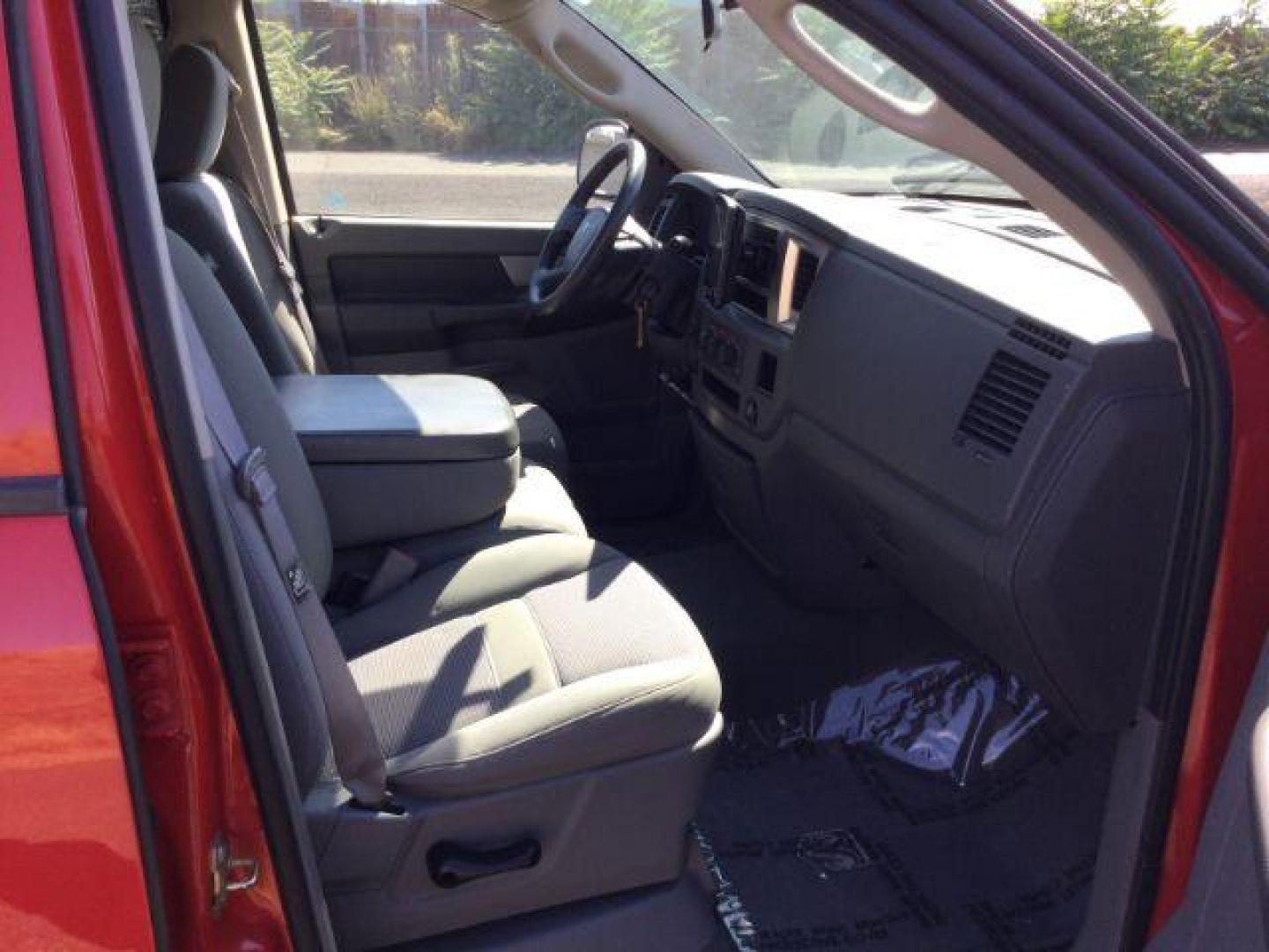 2007 Flame Red Clearcoat /Medium Slate Gray Dodge Ram 1500 Quad Cab SLT 4WD 5.7L V8 (1D7HU18277J) with an 5.7L Hemi V8 engine, 4 speed Automatic transmission, located at 1801 Main Street, Lewiston, 83501, (208) 743-9371, 46.417065, -117.004799 - Photo#9