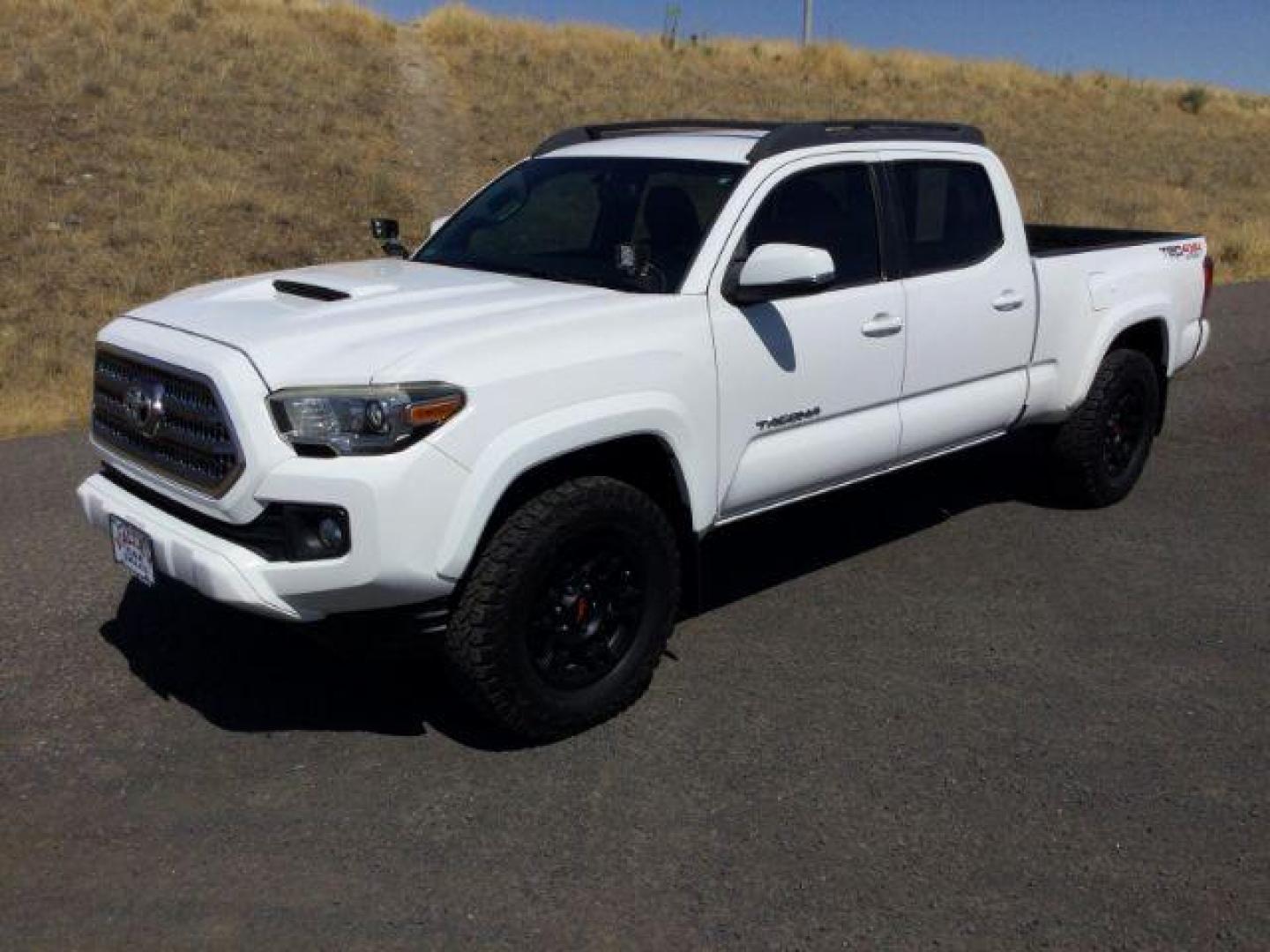 2016 Super White /Black Cloth Toyota Tacoma Crew Cab Long Bed TRD Sport 4WD (3TMDZ5BN0GM) with an 3.5L V-6 port/direct injection engine, 6-Speed Automatic transmission, located at 1801 Main Street, Lewiston, 83501, (208) 743-9371, 46.417065, -117.004799 - Photo#0
