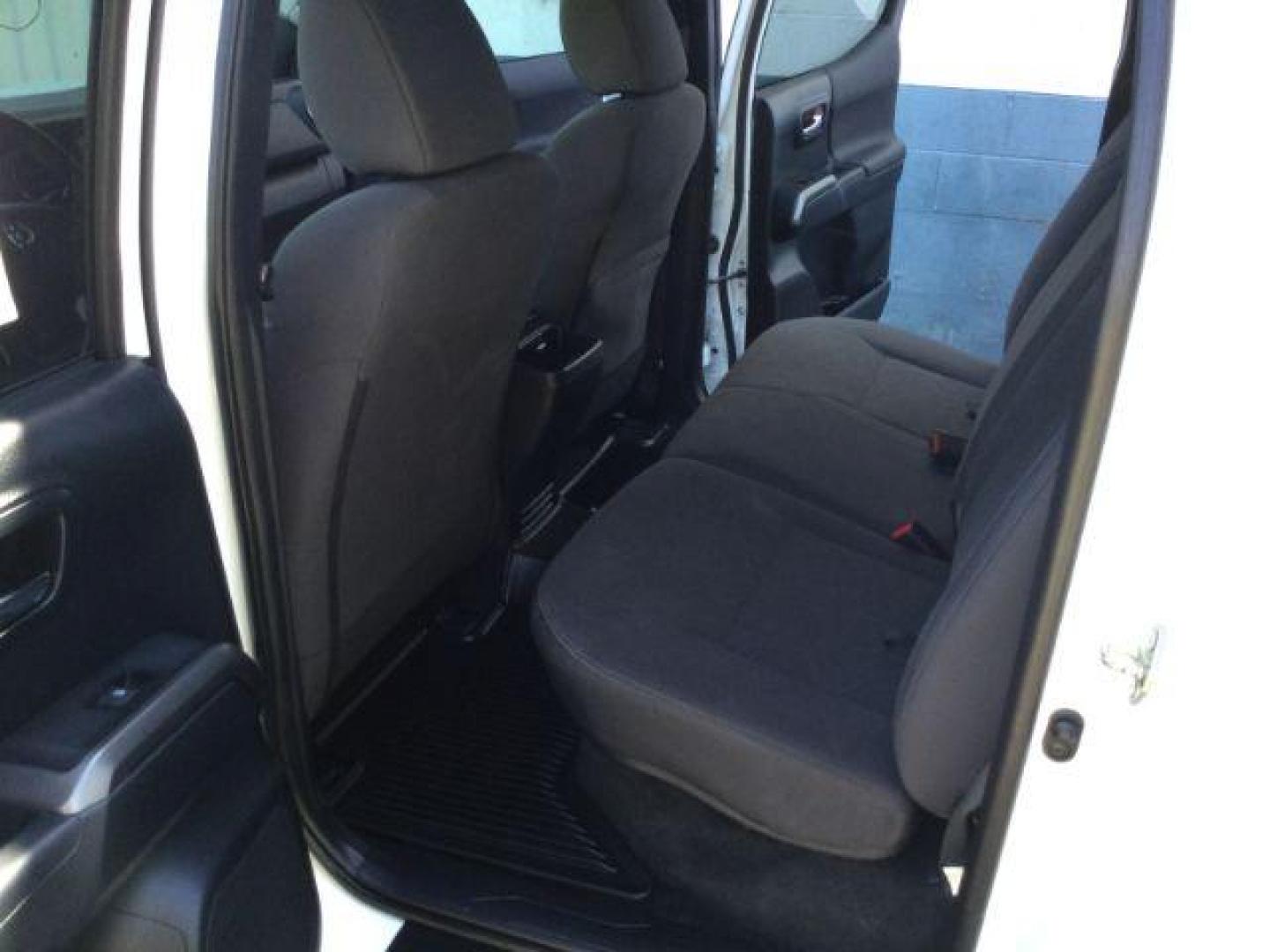 2016 Super White /Black Cloth Toyota Tacoma Crew Cab Long Bed TRD Sport 4WD (3TMDZ5BN0GM) with an 3.5L V-6 port/direct injection engine, 6-Speed Automatic transmission, located at 1801 Main Street, Lewiston, 83501, (208) 743-9371, 46.417065, -117.004799 - Photo#5